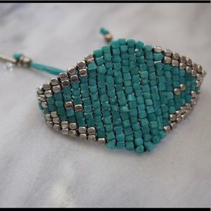 Adjustable silver and turquoise beaded bracelet